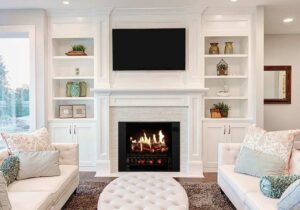 Living room with TV above fireplace
